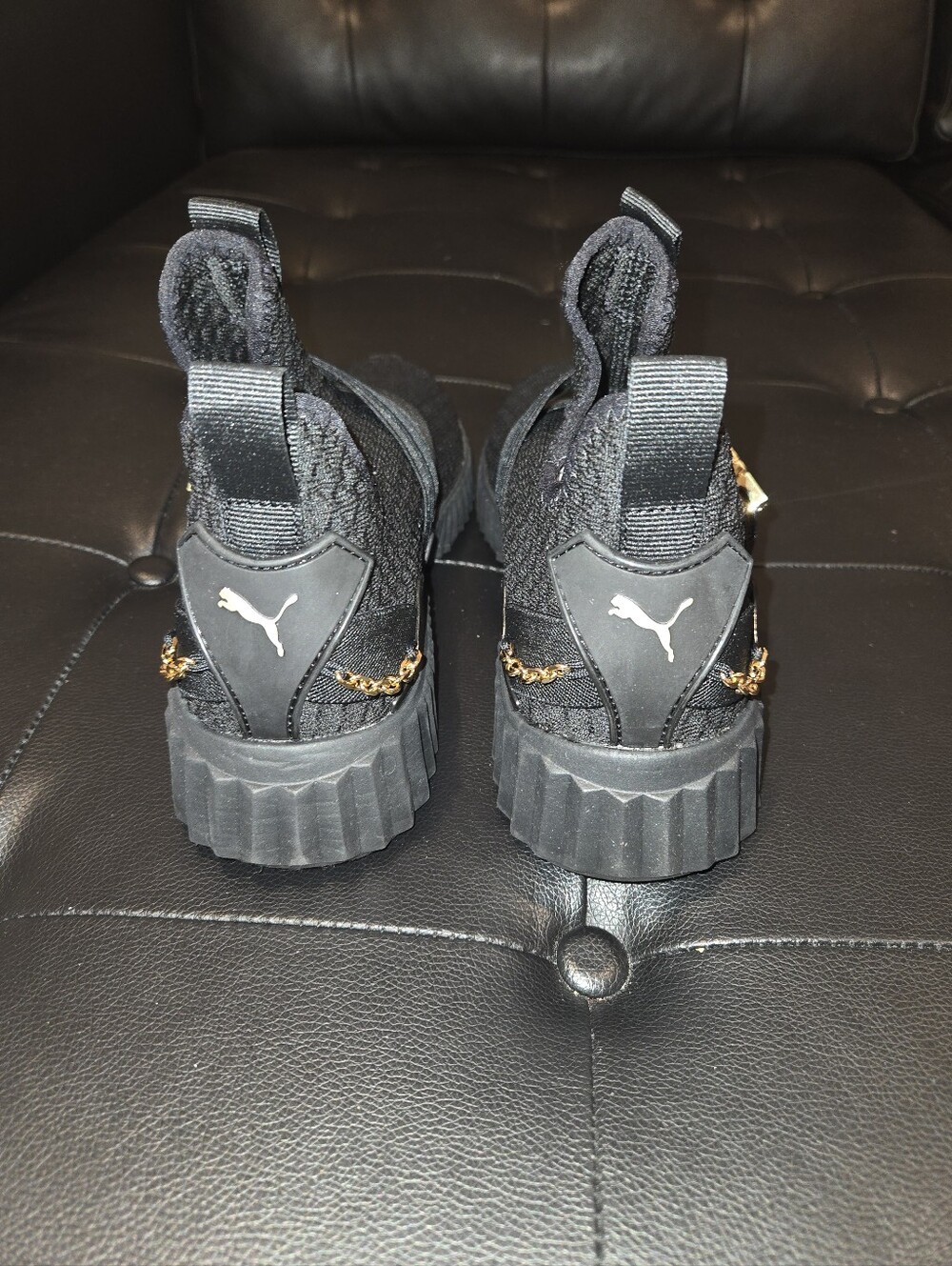 Puma Black Knit Slip-On Trainers with Gold Accents - Picture 3 of 7